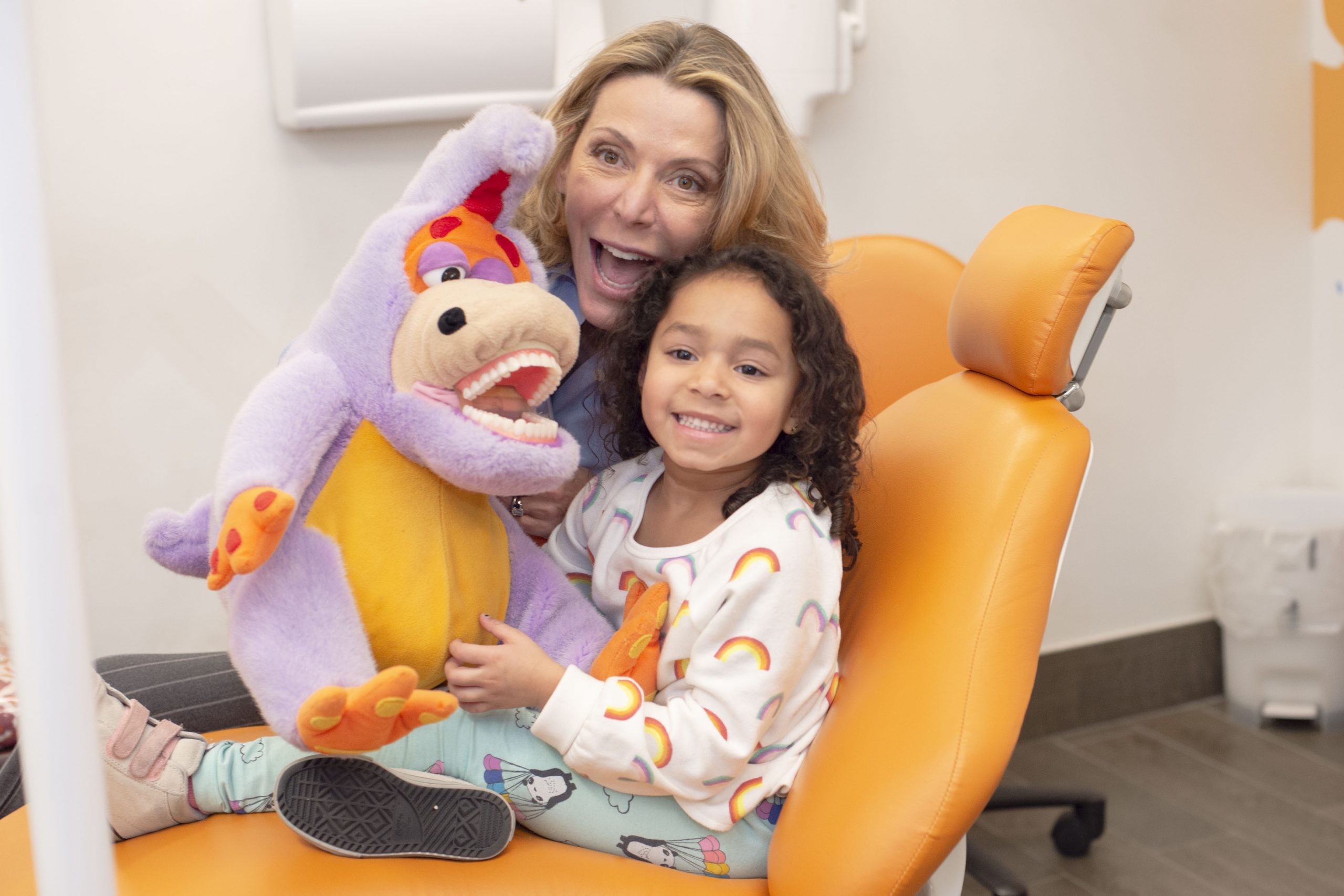 Dr. Corielli teaching child