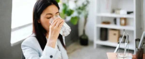 woman drinking water not affected by flouride