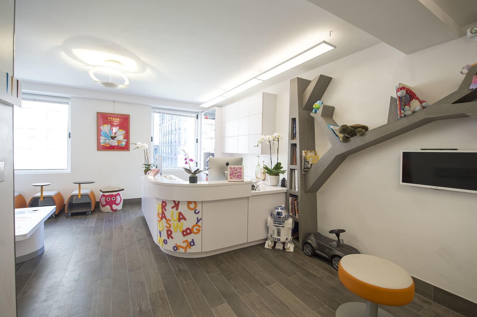 Front desk welcoming families for kids dental care on the Upper East Side