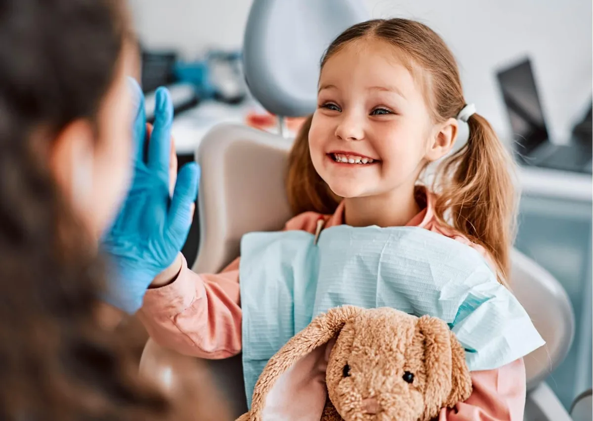Child at a pediatric dental visit as part of routine care to help prevent cavities and maintain healthy teeth.